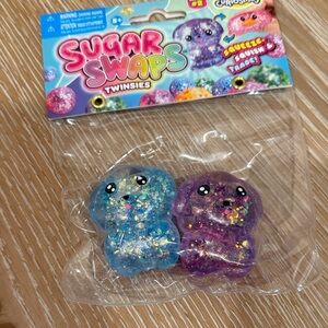 Viral Sugar Swaps Twinsies Glitter Squeeze Toy - Blue & Purple Doggies